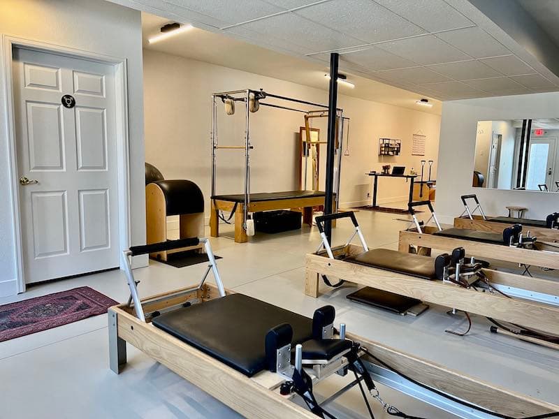 The main studio at Contrology Studio showing Reformers, a Cadillac, a Spine Corrector and a Ladder Barrel